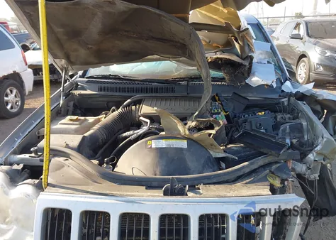 2010 Jeep Grand Cherokee Laredo z USA, uszkodzony, nr VIN 1J4PR4GK4AC125094